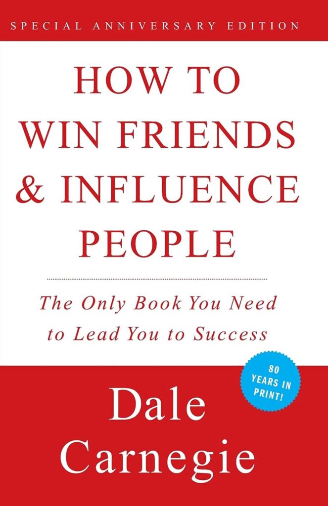戴爾·卡內基 (Dale Carnegie) 所著《如何贏得朋友並影響他人》一書的封面，標題為紅色文字。 