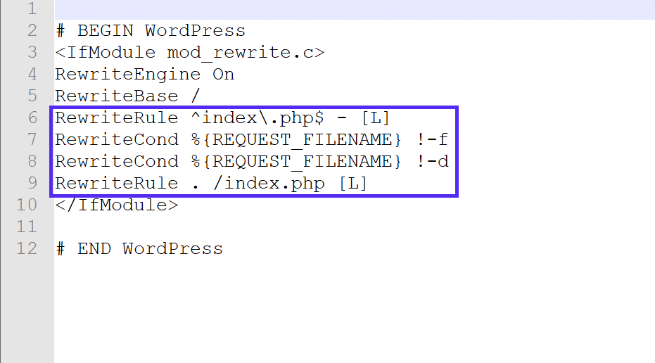 在文本编辑器中打开的 .htaccess 文件的屏幕截图，代码中突出显示了 RewriteXXX 指令。