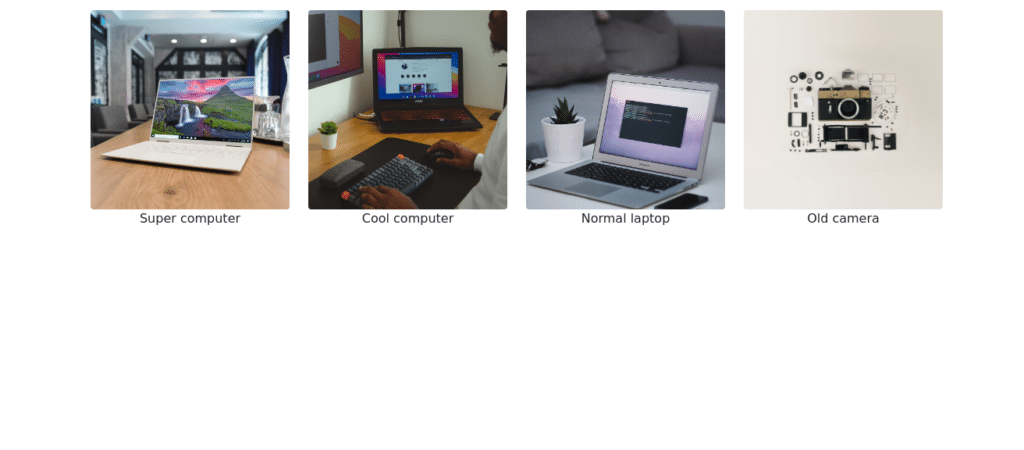 我们正在创建的简单网页，其中显示了技术设备的图像，包括几台笔记本电脑和一台旧相机。